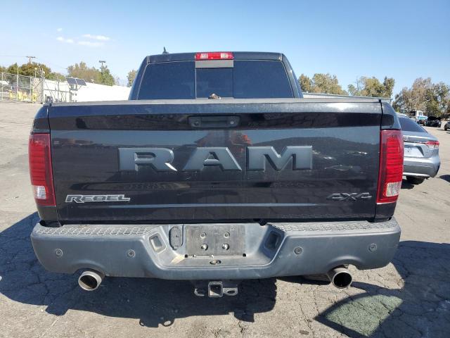 1C6RR7YT3JS135720 - 2018 RAM 1500 REBEL Schwarz Foto 6