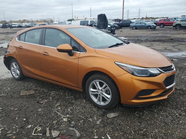 3G1BE6SM8HS607211 - 2017 CHEVROLET CRUZE LT ORANGE photo 4