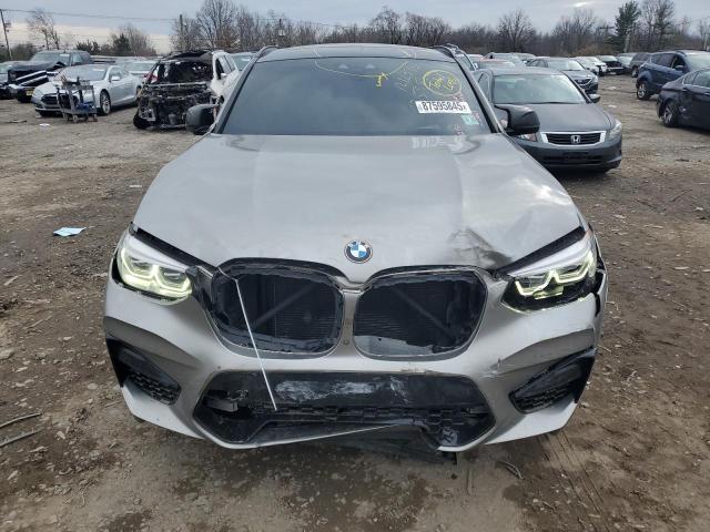 5YMUJ0C03M9F20053 - 2021 BMW X4 M COMPETITION فحمي صورة 5