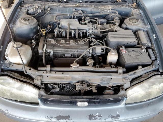 1Y1SK5269SZ085206 - 1995 GEO PRIZM BASE TURQUOISE photo 11