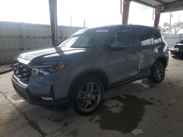 5FNYF8H52PB033710 - 2023 HONDA PASSPORT EXL BLUE photo 1