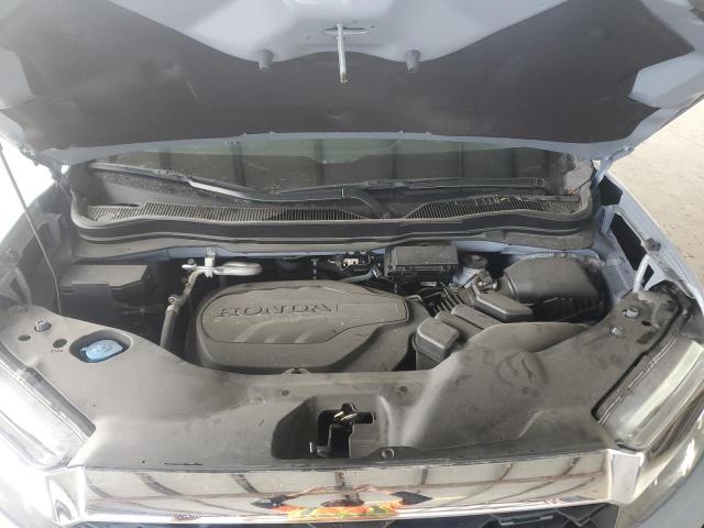 5FNYF8H52PB033710 - 2023 HONDA PASSPORT EXL BLUE photo 12