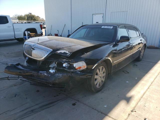 1LNHM84W35Y660056 - 2005 LINCOLN TOWN CAR EXECUTIVE L BLACK photo 1