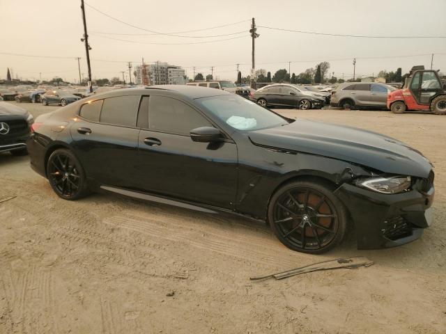 WBAGV8C02NCK08667 - 2022 BMW M850XI BLACK photo 4