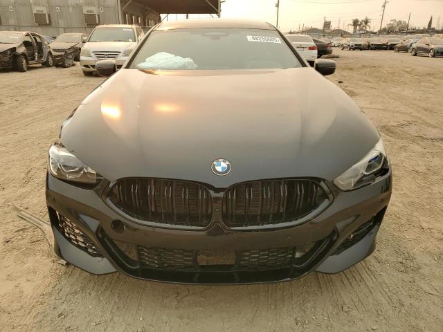 WBAGV8C02NCK08667 - 2022 BMW M850XI BLACK photo 5