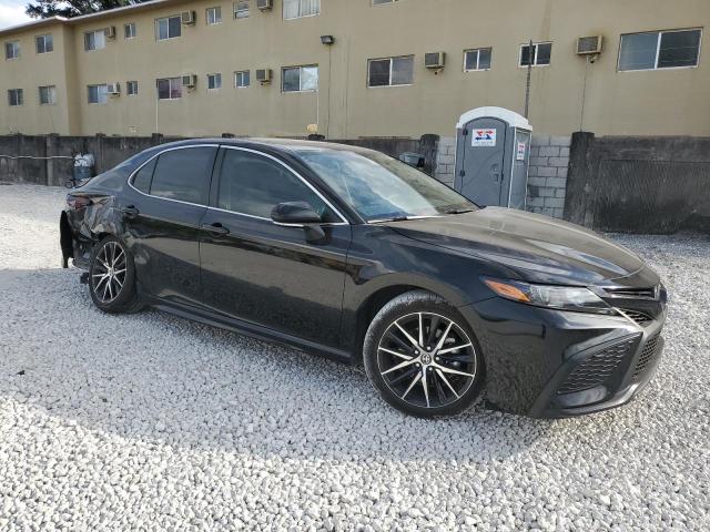 4T1T11AKXRU256566 - 2024 TOYOTA CAMRY SE NIGHT SHADE BLACK photo 4