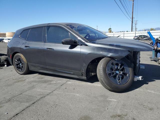 WB523CF09RCR85768 - 2024 BMW IX XDRIVE50 BLACK photo 4