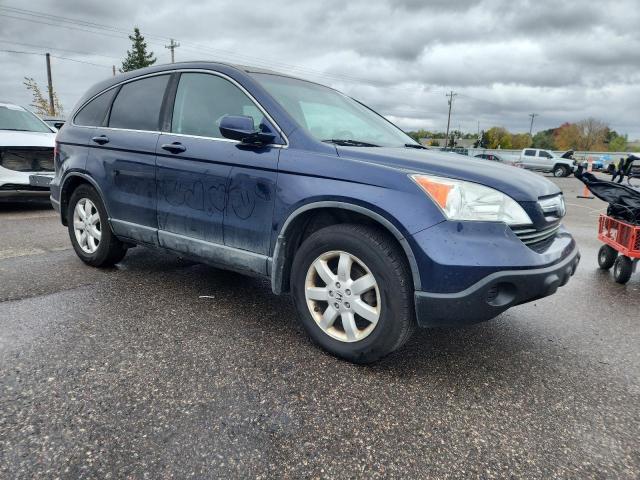 5J6RE48719L800863 - 2009 HONDA CR-V EXL BLUE photo 4