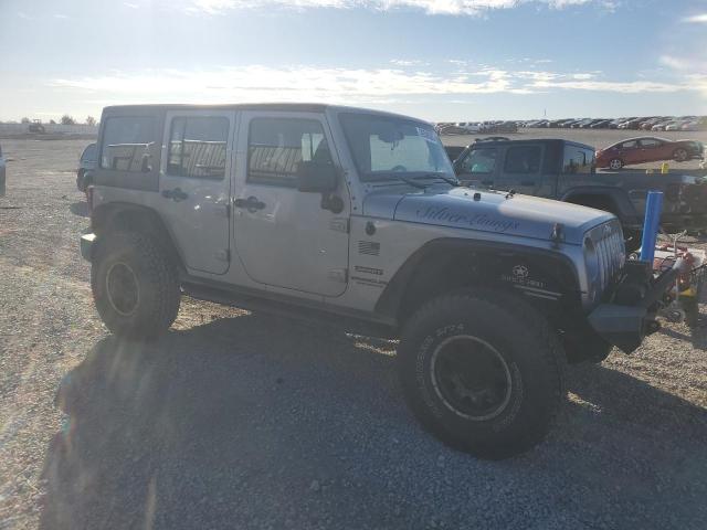 1C4BJWDG4DL688265 - 2013 JEEP WRANGLER U SPORT SILVER photo 4