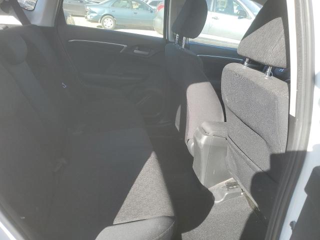 JHMGK5H59GX011018 - 2016 HONDA FIT LX WHITE photo 10