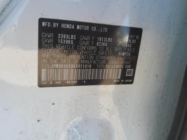 JHMGK5H59GX011018 - 2016 HONDA FIT LX WHITE photo 12