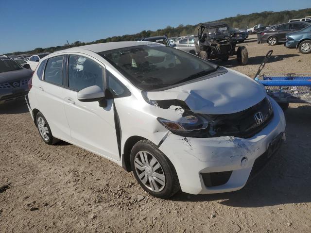 JHMGK5H59GX011018 - 2016 HONDA FIT LX WHITE photo 4