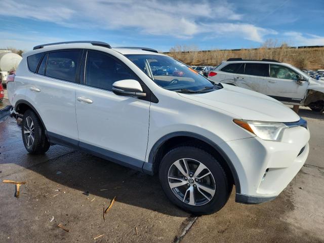 JTMRFREV7HJ108815 - 2017 TOYOTA RAV4 XLE WHITE photo 4