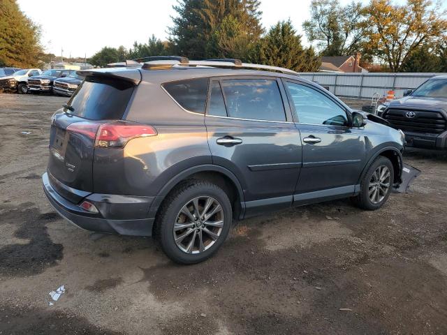 JTMDFREV6JJ748997 - 2018 TOYOTA RAV4 LIMITED Graphite photo 3