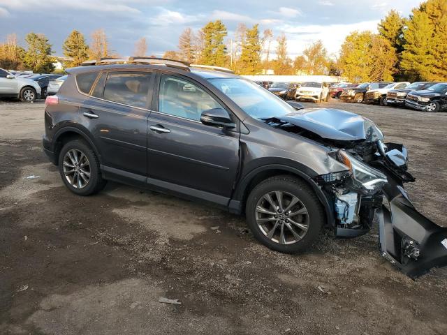 JTMDFREV6JJ748997 - 2018 TOYOTA RAV4 LIMITED Graphite photo 4