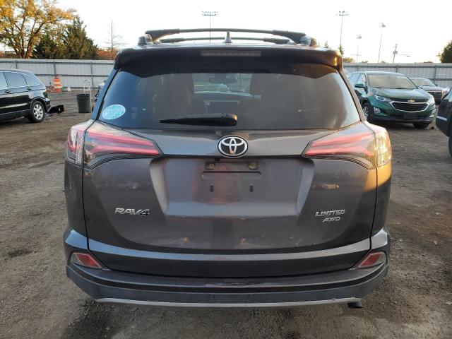 JTMDFREV6JJ748997 - 2018 TOYOTA RAV4 LIMITED Graphite photo 6