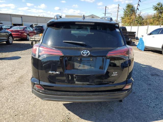 2T3BFREV0JW716281 - 2018 TOYOTA RAV4 LE BLACK photo 6