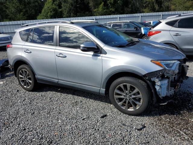 JTMYFREV0JD123088 - 2018 TOYOTA RAV4 LIMITED ვერცხლისფერი ფოტო 4