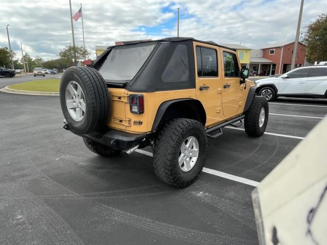 1C4BJWDG3EL156961 - 2014 JEEP WRANGLER U SPORT Դեղին լուսանկար 4