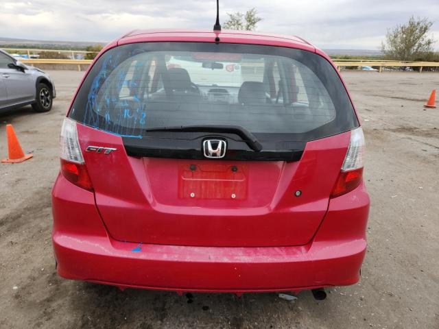 JHMGE8H29AC019830 - 2010 HONDA FIT RED photo 6