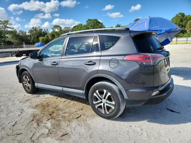 2T3ZFREVXGW247532 - 2016 TOYOTA RAV4 LE GRAY photo 2