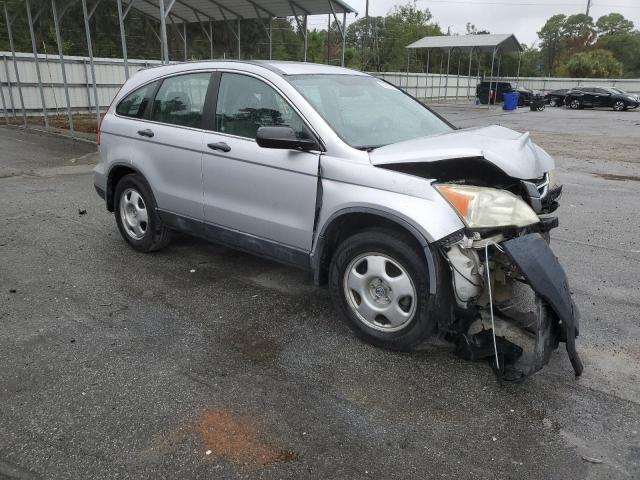 5J6RE3H37BL035560 - 2011 HONDA CR-V LX SILVER photo 4