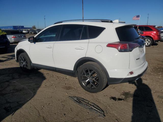 2T3JFREV4GW453264 - 2016 TOYOTA RAV4 SE WHITE photo 2