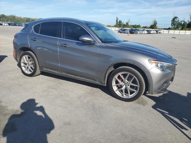 ZASFAKBNXJ7B98405 - 2018 ALFA ROMEO STELVIO TI Серебристый фото 4