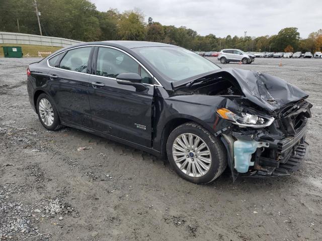 3FA6P0SU5ER299259 - 2014 FORD FUSION TITANIUM PHEV BLACK photo 4