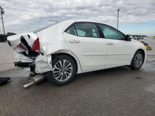 5YFBURHE0KP879249 - 2019 TOYOTA COROLLA L WHITE photo 3