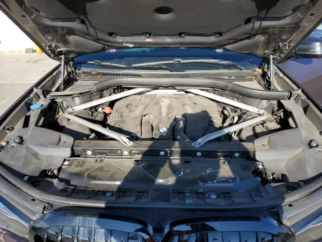 5UXCX4C55KLS36456 - 2019 BMW X7 XDRIVE50I PURPLE photo 12