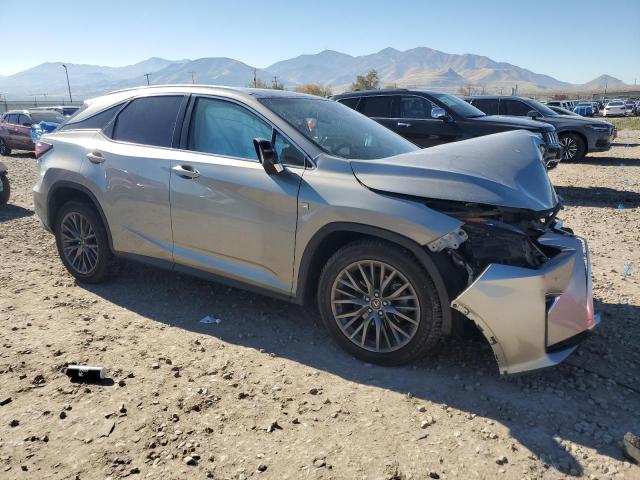 2T2BZMCA6HC120585 - 2017 LEXUS RX 350 BASE BEIGE photo 4