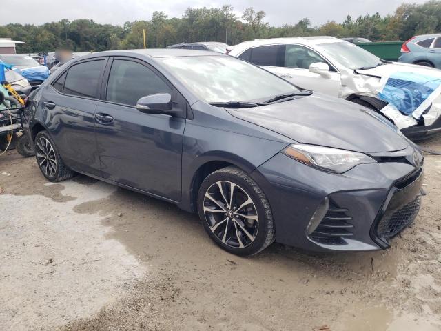 5YFBURHE4KP881313 - 2019 TOYOTA COROLLA L ნაცრისფერი ფოტო 4