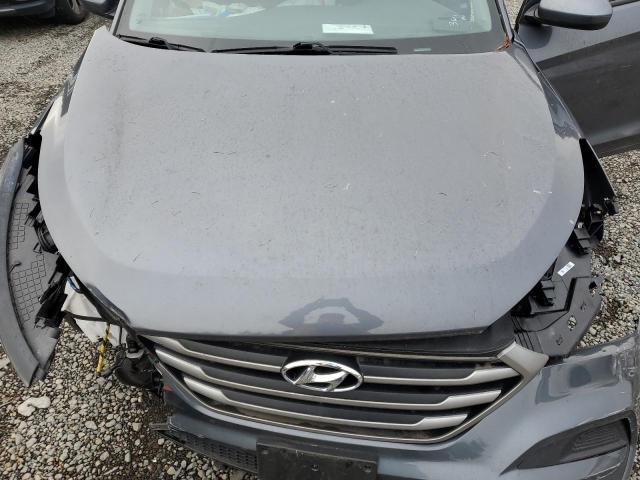 KM8J2CA44JU605808 - 2018 HYUNDAI TUCSON SE رمادي صورة 12