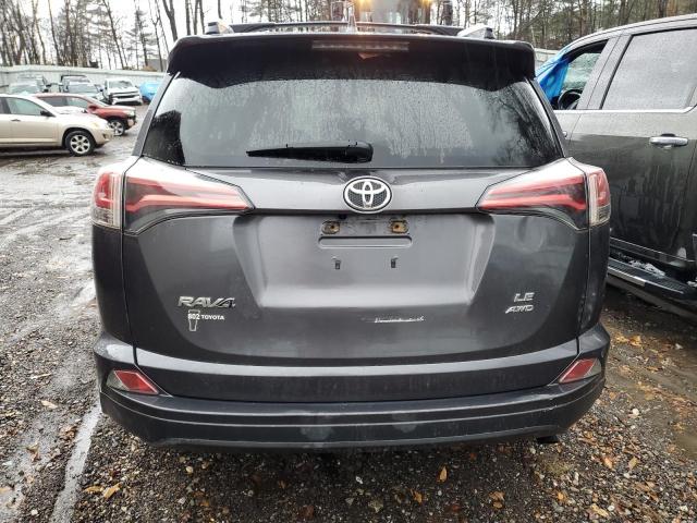 JTMBFREV7JJ177513 - 2018 TOYOTA RAV4 LE Grau Foto 6