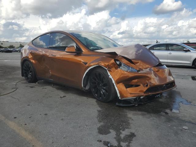 7SAYGDEF4NF529899 - 2022 TESLA MODEL Y Orange Foto 4