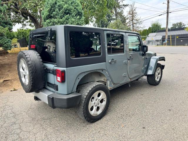 1C4BJWEG1EL304085 - 2014 JEEP WRANGLER U SAHARA GRAY photo 4