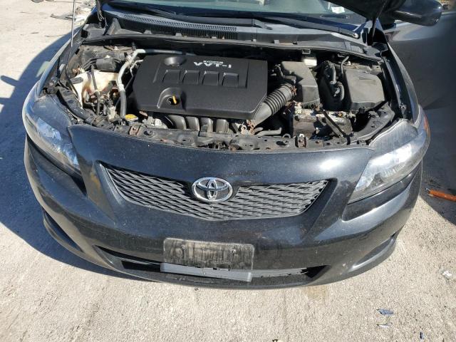 1NXBU4EE8AZ261004 - 2010 TOYOTA COROLLA BASE Schwarz Foto 11