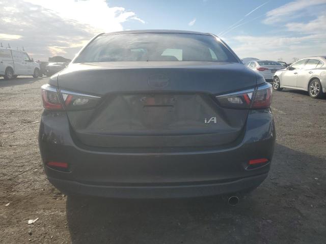 3MYDLBZV5GY138945 - 2016 TOYOTA SCION IA GRAY photo 6