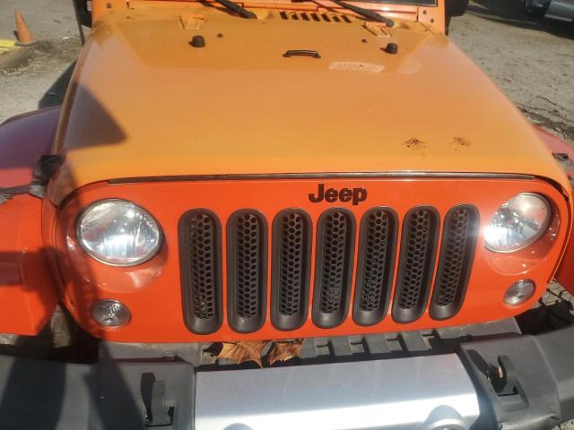 1C4HJWEG8FL636942 - 2015 JEEP WRANGLER U SAHARA ORANGE photo 11