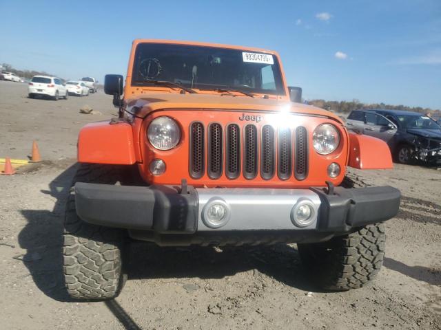 1C4HJWEG8FL636942 - 2015 JEEP WRANGLER U SAHARA ORANGE photo 5