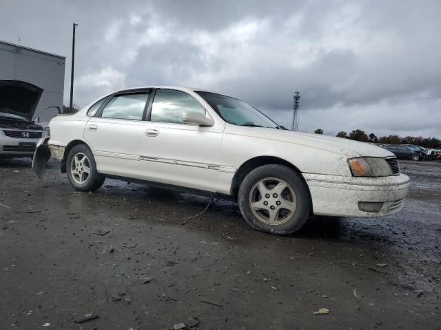 4T1BF18B0XU300347 - 1999 TOYOTA AVALON XL WHITE photo 4