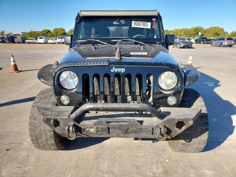 1C4BJWEG4EL147202 - 2014 JEEP WRANGLER U SAHARA BLACK photo 5