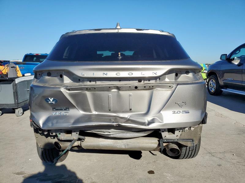 5LMCJ2D99GUJ24035 - 2016 LINCOLN MKC SELECT أسمر صورة 6