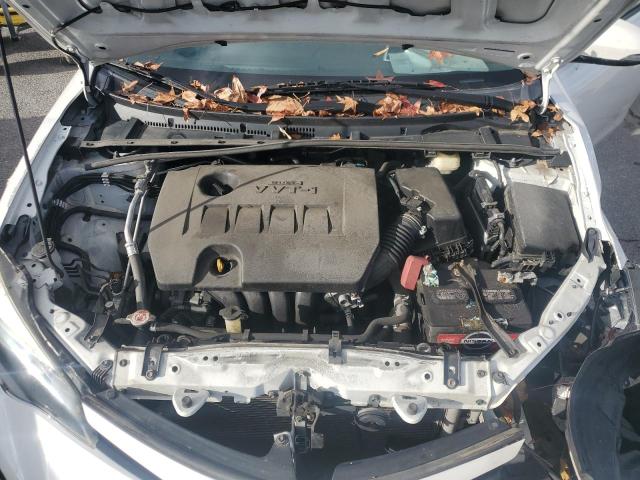 5YFBURHE5HP727931 - 2017 TOYOTA COROLLA L თეთრი ფოტო 11