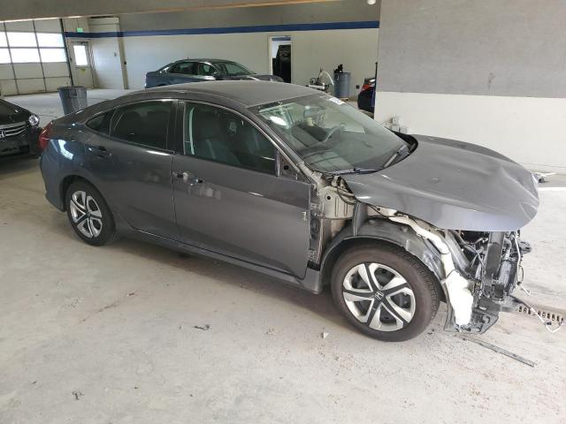 2HGFC2F59JH596692 - 2018 HONDA CIVIC LX 灰色 照片 4