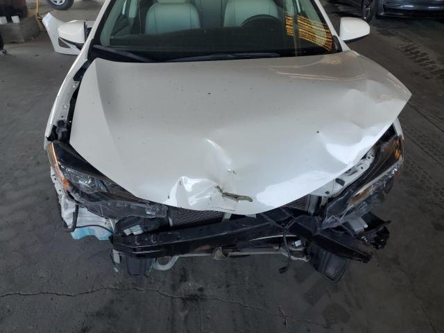 5YFBURHE1JP846131 - 2018 TOYOTA COROLLA L WHITE photo 11