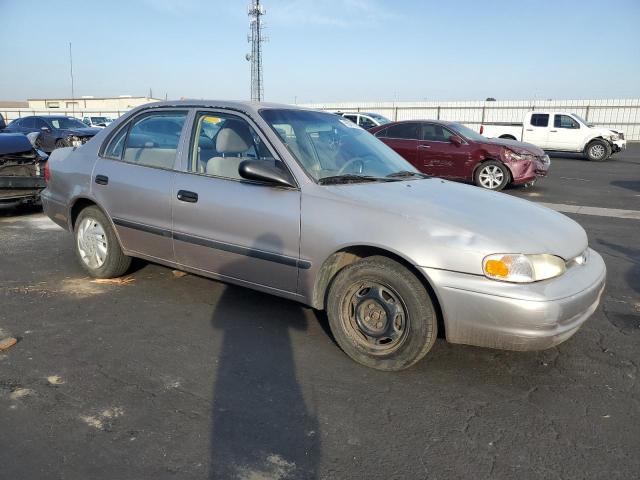 1Y1SK5282XZ404342 - 1999 CHEVROLET GEO PRIZM BASE SILVER photo 4