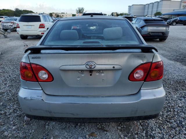 1NXBR38E44Z250089 - 2004 TOYOTA COROLLA CE Silber Foto 6