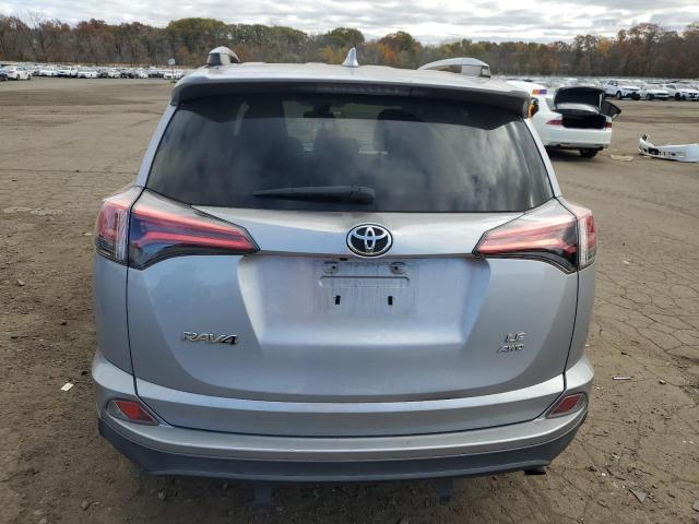 2T3BFREV1HW609752 - 2017 TOYOTA RAV4 LE SILVER photo 6